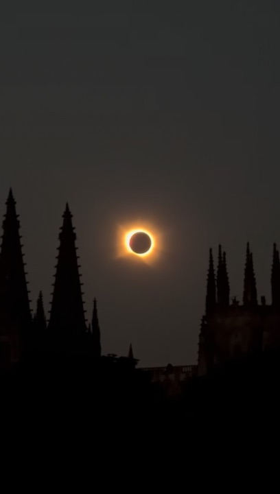 Total eclipse over the gothic spires of Burgos